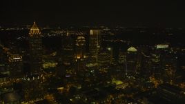 A group of skyscrapers at night in Midtown Atlanta, Georgia Aerial Stock Photos | AX41_028.0000078F