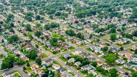 Homes in a Massapequa Park suburban neighborhood, Long Island, New York Aerial Stock Photos | AXP071_000_0004F