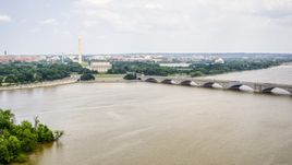 The Washington Monument, Lincoln Memorial, and Arlington Memorial Bridge in Washington DC Aerial Stock Photos | AXP074_000_0011F
