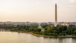 The Washington Monument and White House seen from Tidal Basin, Washington D.C., sunset Aerial Stock Photos | AXP076_000_0010F
