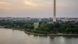 The Washington Monument and White House seen from Tidal Basin, Washington D.C., twilight Aerial Stock Photos | AXP076_000_0026F