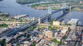 The Benjamin Franklin Bridge spanning the Delaware River between Philadelphia, Pennsylvania and Camden, New Jersey Aerial Stock Photos | AXP079_000_0011F