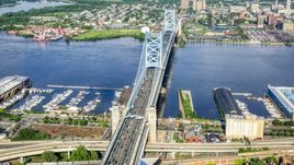 The Benjamin Franklin Bridge over the Delaware River between Philadelphia, Pennsylvania and Camden, New Jersey Aerial Stock Photos | AXP079_000_0012F