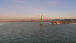 The Golden Gate Bridge with Downtown San Francisco skyline behind it, California, sunset Aerial Stock Photos | DCSF07_048.0000059