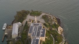 The Alcatraz lighthouse and main building, San Francisco, California, sunset Aerial Stock Photos | DCSF10_024.0000245