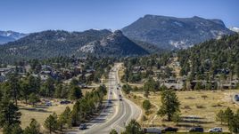 Cars on a road through the mountain town of Estes Park, Colorado Aerial Stock Photos | DXP001_000218