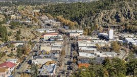 Shops on a road through Estes Park, Colorado Aerial Stock Photos | DXP001_000224