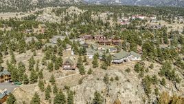Rural homes on a rugged hillside, Estes Park, Colorado Aerial Stock Photos | DXP001_000230