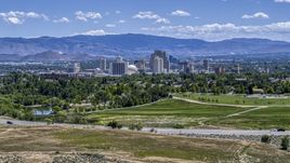 A wide view of the city's skyline in Reno, Nevada Aerial Stock Photos | DXP001_004_0001