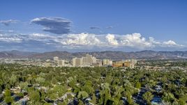 A wide view of the city skyline in Reno, Nevada Aerial Stock Photos | DXP001_005_0003