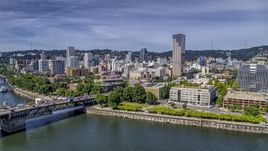 City buildings across the Willamette River in Downtown Portland, Oregon Aerial Stock Photos | DXP001_012_0004