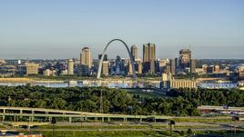 A view from the interstate of the Arch and skyline, sunrise, Downtown St. Louis, Missouri Aerial Stock Photos | DXP001_021_0007