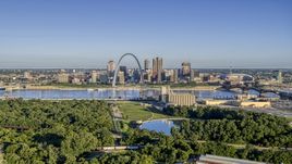 A park and the St. Louis skyline across Mississippi River,Downtown St. Louis, Missouri Aerial Stock Photos | DXP001_022_0001