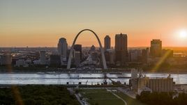 The iconic Gateway Arch and Downtown St. Louis skyline, Missouri at sunset Aerial Stock Photos | DXP001_029_0002