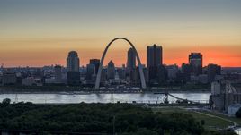 Gateway Arch and Downtown St. Louis, Missouri skyline in silhouette at sunset Aerial Stock Photos | DXP001_029_0012