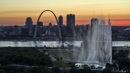 The Gateway Geyser and Arch, Downtown St. Louis, Missouri, twilight Aerial Stock Photos | DXP001_030_0001