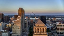 The Gateway Arch seen from the top of a downtown courthouse at sunset, Downtown St. Louis, Missouri Aerial Stock Photos | DXP001_036_0003