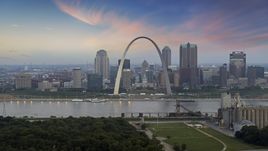 Gateway Arch and Downtown St. Louis, Missouri, beside the Mississippi River at twilight Aerial Stock Photos | DXP001_037_0007
