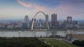 The Arch and skyline in Downtown St. Louis, Missouri, by Mississippi River at twilight Aerial Stock Photos | DXP001_037_0010
