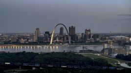 A view of the Gateway Arch and the Mississippi River at twilight, Downtown St. Louis, Missouri Aerial Stock Photos | DXP001_037_0012