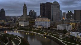 The city skyline and the Scioto River at twilight, Downtown Columbus, Ohio Aerial Stock Photos | DXP001_087_0007