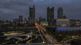 The city skyline across the bridge and river at twilight, Downtown Columbus, Ohio Aerial Stock Photos | DXP001_088_0003