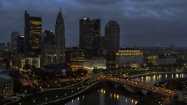 The city's skyline beside a bridge and river at twilight, Downtown Columbus, Ohio Aerial Stock Photos | DXP001_088_0006