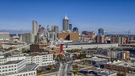 The city skyline and brick factory in Downtown Indianapolis, Indiana Aerial Stock Photos | DXP001_089_0001