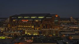 The football stadium at twilight in Indianapolis, Indiana Aerial Stock Photos | DXP001_093_0004