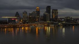 A view of the skyline lit up at twilight, seen from Ohio River, Downtown Louisville, Kentucky Aerial Stock Photos | DXP001_096_0014