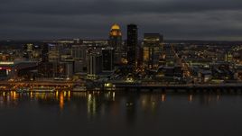The city's skyline at twilight, seen from Ohio River, Downtown Louisville, Kentucky Aerial Stock Photos | DXP001_096_0015