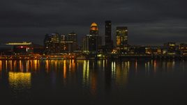 A view across the Ohio River toward the city skyline at twilight, Downtown Louisville, Kentucky Aerial Stock Photos | DXP001_096_0018