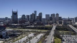 The city's skyline near the river in Downtown Nashville, Tennessee Aerial Stock Photos | DXP002_112_0001