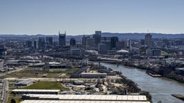 The city's skyline by the Cumberland River in Downtown Nashville, Tennessee Aerial Stock Photos | DXP002_112_0006