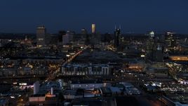 A wide view of the city skyline, high-rise under construction at twilight, Downtown Nashville, Tennessee Aerial Stock Photos | DXP002_115_0010