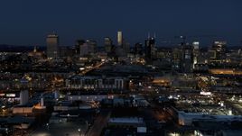 A wide view of city skyline at twilight, near high-rise construction, Downtown Nashville, Tennessee Aerial Stock Photos | DXP002_115_0012