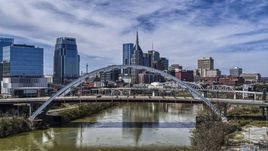 Korean War Veterans Memorial Bridge and skyscrapers in the background in Downtown Nashville, Tennessee Aerial Stock Photos | DXP002_116_0005