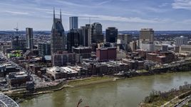 The city's skyline overlooking the Cumberland River, Downtown Nashville, Tennessee Aerial Stock Photos | DXP002_117_0005