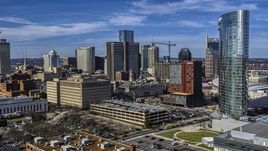 A view of tall skyscrapers and city buildings in Downtown Nashville, Tennessee Aerial Stock Photos | DXP002_118_0004