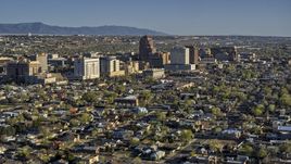 The city's high-rises seen from neighborhoods in Downtown Albuquerque, New Mexico Aerial Stock Photos | DXP002_122_0002