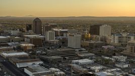 A view of high-rise office buildings at sunset, Downtown Albuquerque, New Mexico Aerial Stock Photos | DXP002_122_0008
