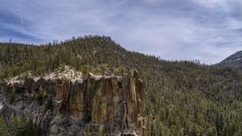 A close-up of a rock formation in the mountains in New Mexico Aerial Stock Photos | DXP002_129_0008