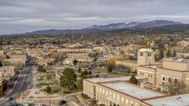 Downtown seen from tower and flags on Bataan Memorial Building, Santa Fe, New Mexico Aerial Stock Photos | DXP002_131_0007