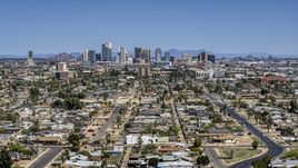 A view of the city's distant skyline, Downtown Phoenix, Arizona Aerial Stock Photos | DXP002_136_0010