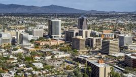 A view of tall high-rise office towers and city buildings in Downtown Tucson, Arizona Aerial Stock Photos | DXP002_144_0007