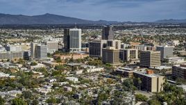 A pair of tall high-rise office towers and city buildings in Downtown Tucson, Arizona Aerial Stock Photos | DXP002_144_0009