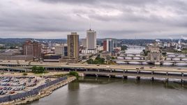 An apartment high-rise and office buildings near bridges over the river, Downtown Cedar Rapids, Iowa Aerial Stock Photos | DXP002_164_0001