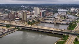 Bridges spanning the river by Downtown Cedar Rapids, Iowa Aerial Stock Photos | DXP002_164_0005