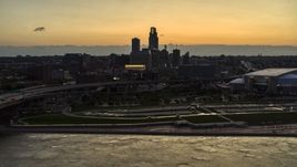 A view of the skyline from the river at twilight, Downtown Omaha, Nebraska Aerial Stock Photos | DXP002_172_0015