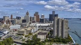 The skyline in the distance seen from apartment complex, Downtown Detroit, Michigan Aerial Stock Photos | DXP002_189_0002
